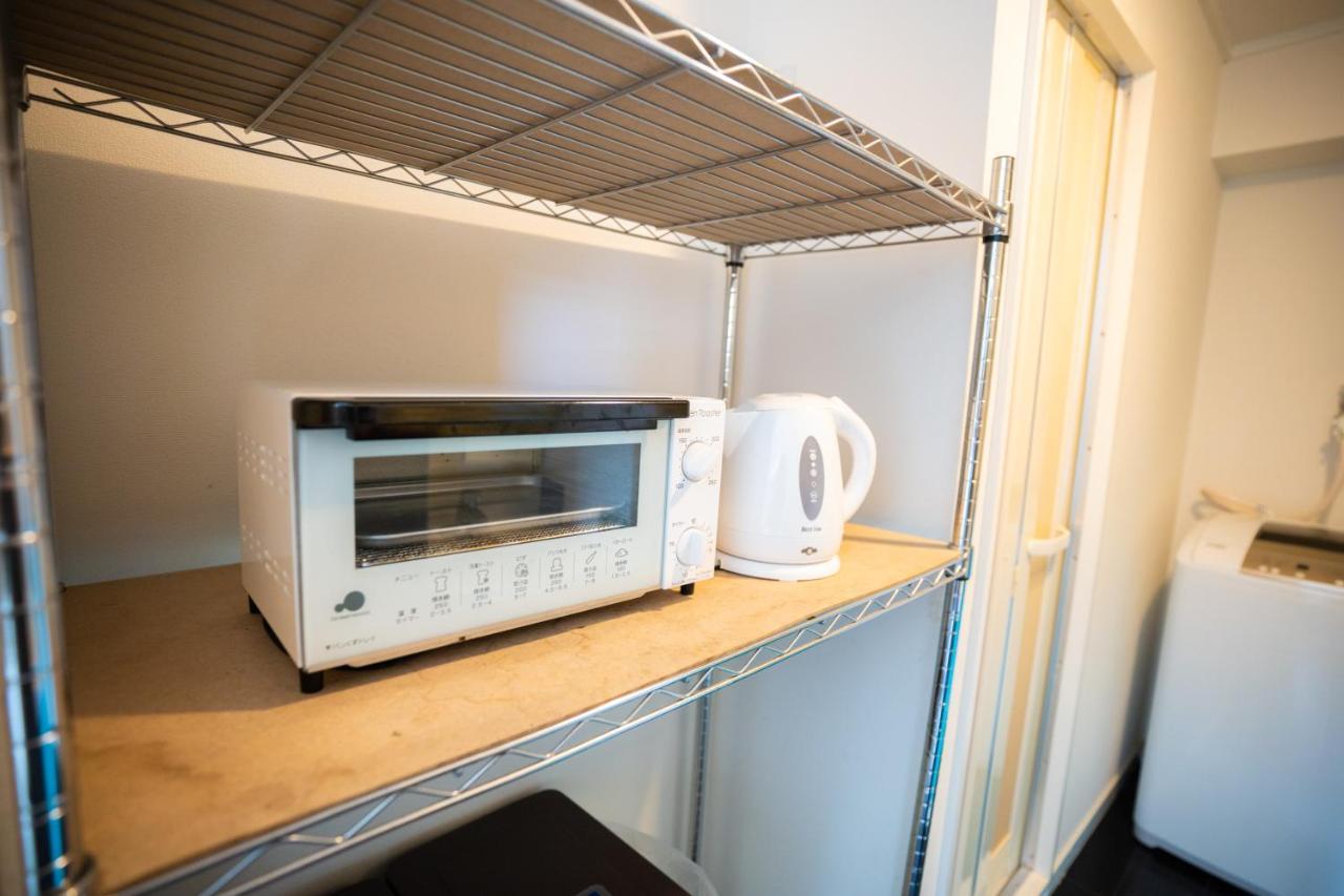 スマイルハイツ Appartement Naha Buitenkant foto
